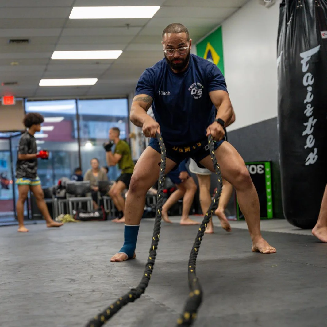 Adult on the battle ropes